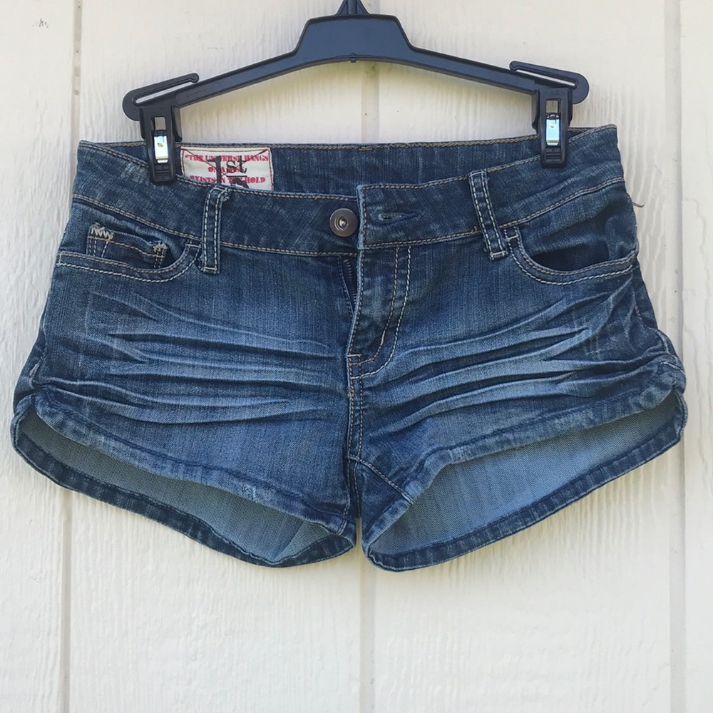 Short shorts, dark wash, tribal back pockets